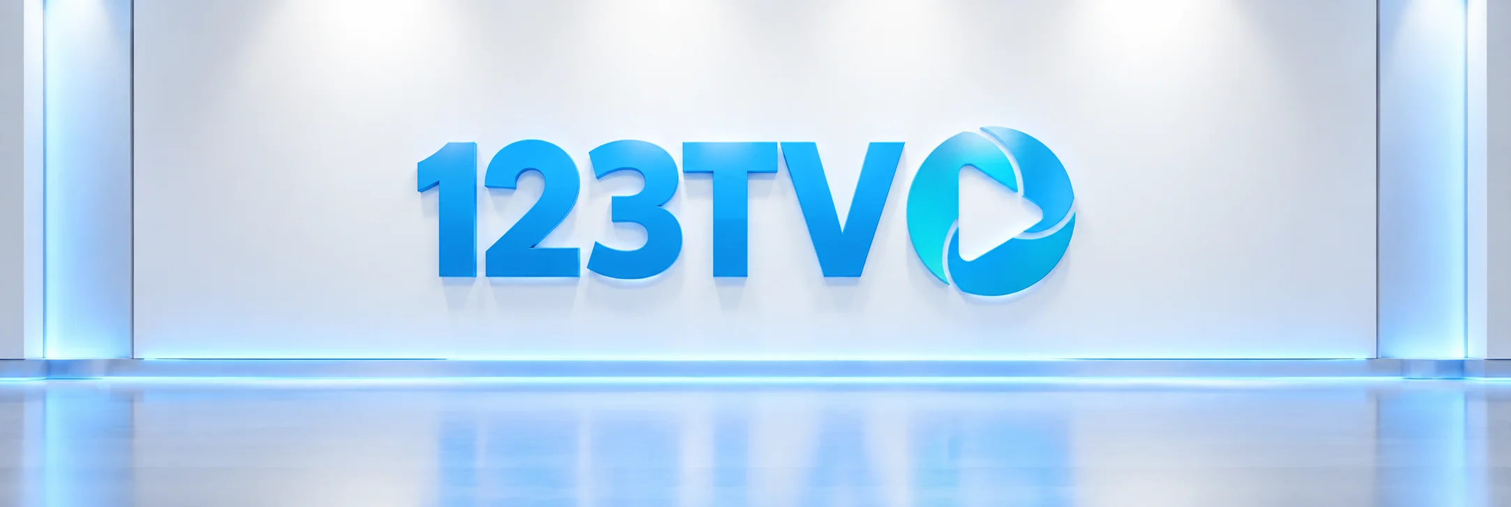 123TV blue lettering and turquoise play emblem on a white broadcast-style wall